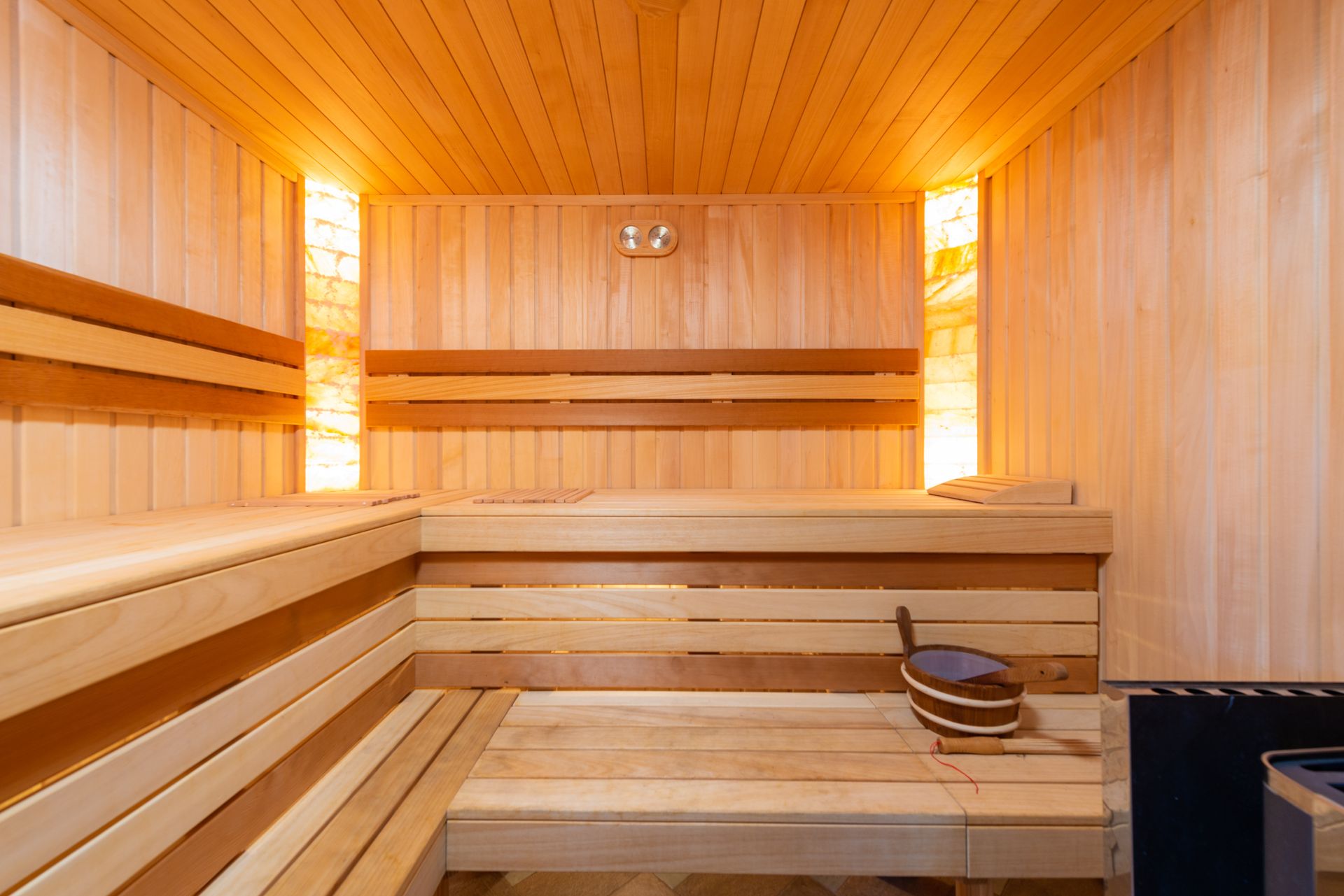 Warm cedar sauna interior with benches