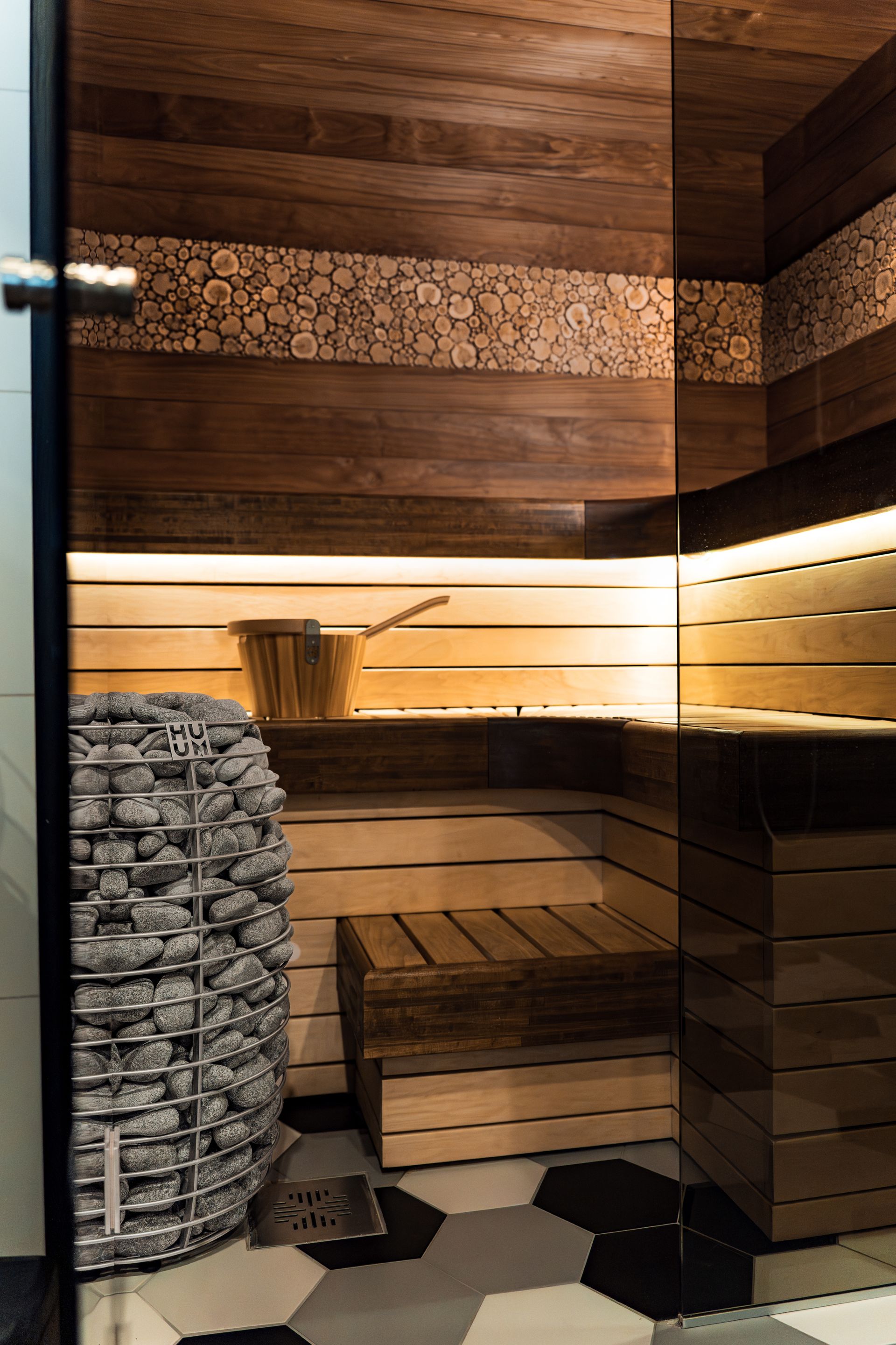 Modern wooden sauna cabin with electric heater